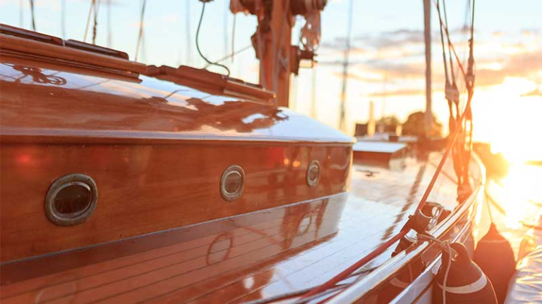 Vintage boat cruising on serene waters